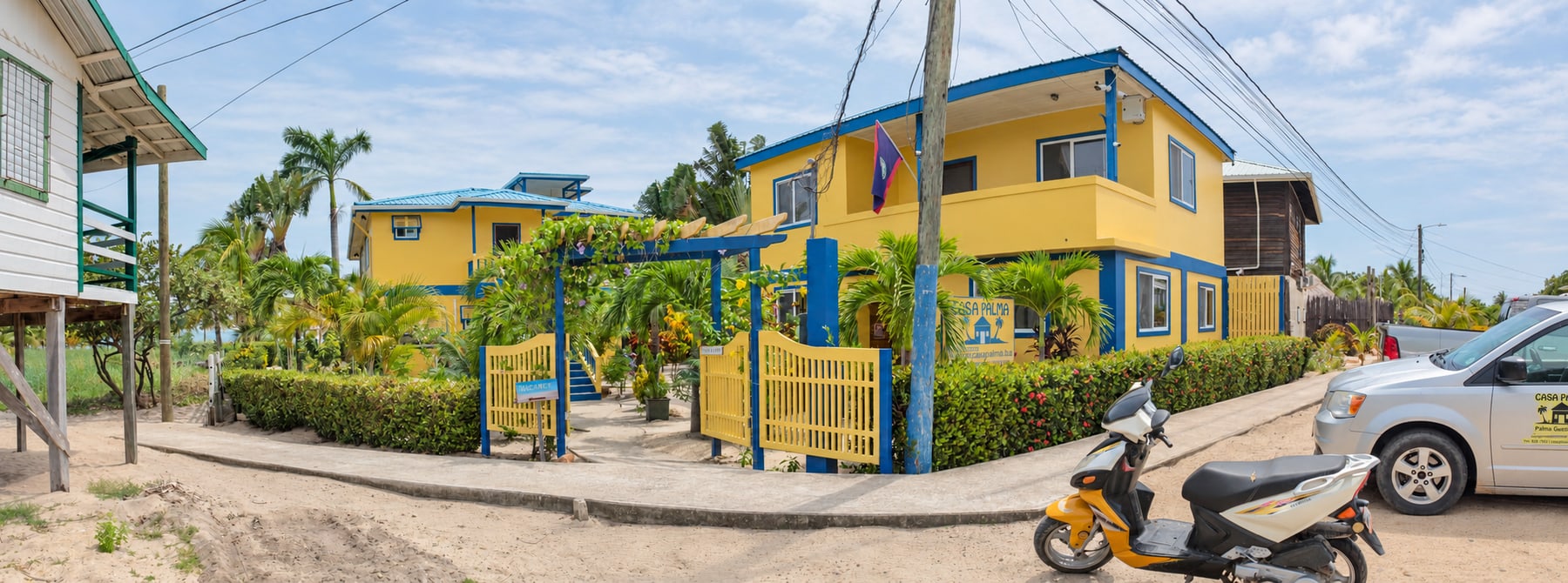Casa Palma beachfront property entrance beside the Placencia Sidewalk